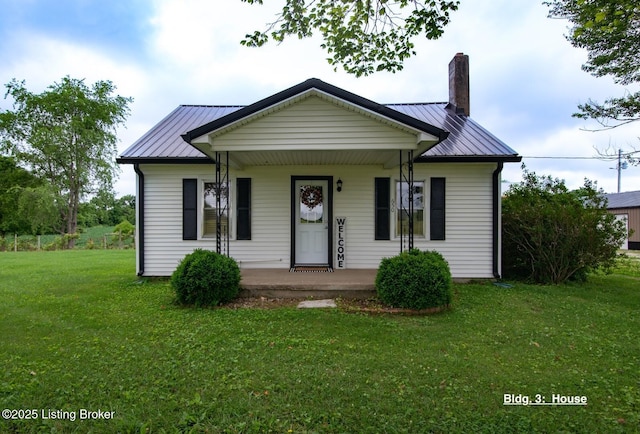 650 Midway Rd, Guston, KY 40142 - view of front of property featuring a chimney, a standing seam roof, a porch, and a metal roof