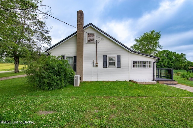 650 Midway Rd, Guston, KY 40142 - view of side of property with a lawn and a chimney