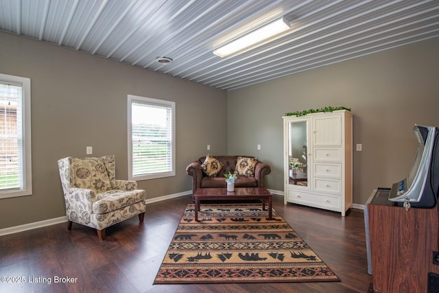 650 Midway Rd, Guston, KY 40142 - sitting room with plenty of natural light and dark wood finished floors