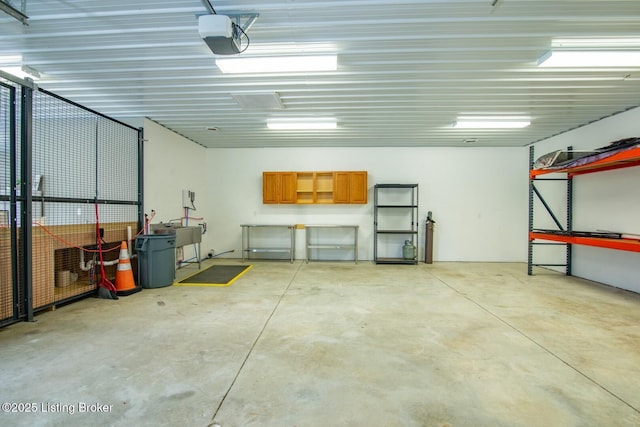650 Midway Rd, Guston, KY 40142 - garage featuring a garage door opener