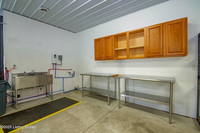 650 Midway Rd, Guston, KY 40142 - garage featuring a sink and pet washing area