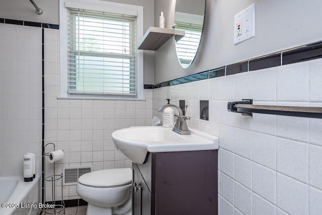 1701 Quarry Hill Rd, Louisville, KY 40213 - bathroom with tile walls, vanity, shower / tub combination, a wainscoted wall, and tile patterned flooring