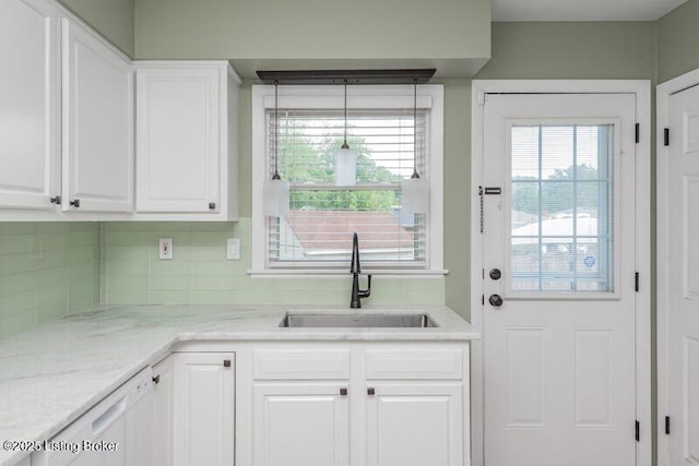 1701 Quarry Hill Rd, Louisville, KY 40213 - kitchen featuring white cabinets, tasteful backsplash, and white dishwasher