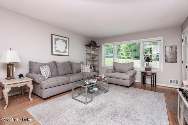 1701 Quarry Hill Rd, Louisville, KY 40213 - living room with light wood-type flooring and baseboards