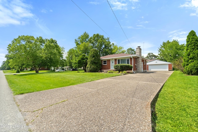 8703 Fernview Dr, Louisville, KY 40291 - view of front of house with a chimney, a garage, a front yard, driveway, and brick siding