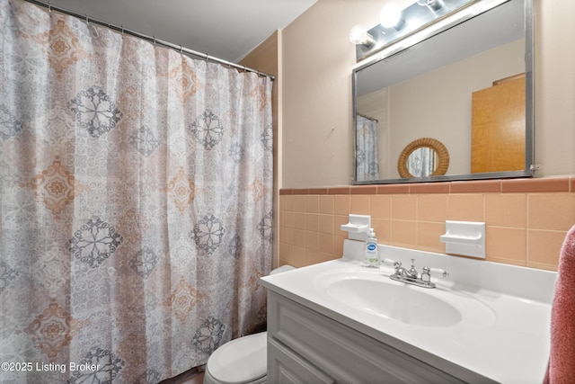 8703 Fernview Dr, Louisville, KY 40291 - bathroom featuring tile walls, vanity, wainscoting, and a shower with shower curtain