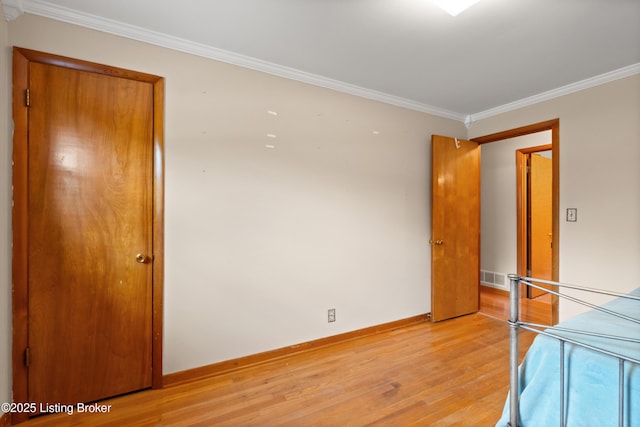 8703 Fernview Dr, Louisville, KY 40291 - bedroom featuring light wood-style floors and crown molding