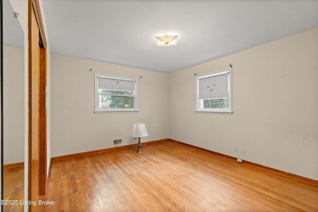 8703 Fernview Dr, Louisville, KY 40291 - unfurnished bedroom featuring light wood-style flooring and a closet
