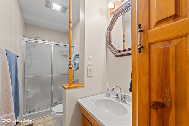 8703 Fernview Dr, Louisville, KY 40291 - bathroom with a shower with door, vanity, and tile patterned flooring