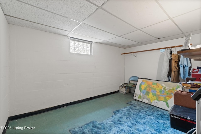 8703 Fernview Dr, Louisville, KY 40291 - below grade area featuring tile patterned floors and a drop ceiling