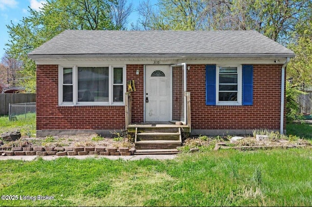 3116 Wilkie Rd, Louisville, KY 40216 - bungalow-style home with brick siding and roof with shingles