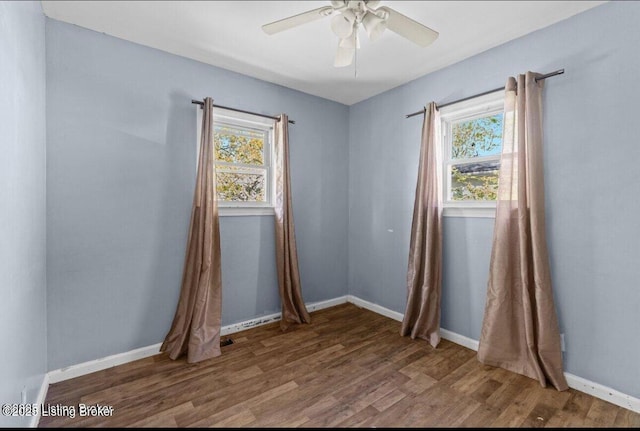 3116 Wilkie Rd, Louisville, KY 40216 - spare room with healthy amount of natural light, a ceiling fan, and wood finished floors
