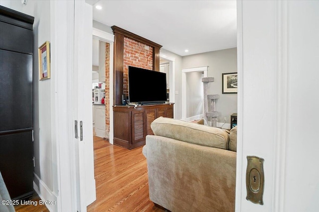 2449 Ransdell Ave, Louisville, KY 40204 - living room featuring light wood-type flooring and recessed lighting