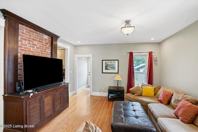 2449 Ransdell Ave, Louisville, KY 40204 - living room with light wood finished floors and recessed lighting