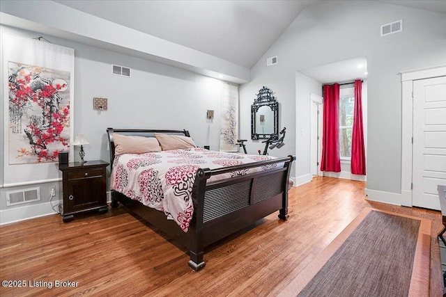 2449 Ransdell Ave, Louisville, KY 40204 - bedroom with wood finished floors and high vaulted ceiling