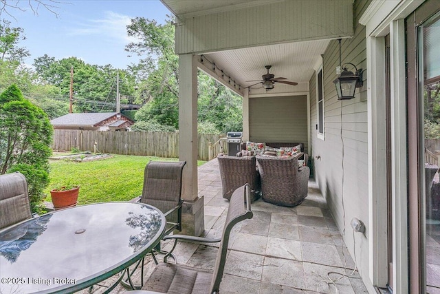 2449 Ransdell Ave, Louisville, KY 40204 - fenced backyard with ceiling fan, a patio area, outdoor dining space, and grilling area