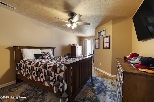 6716 Arbor Creek Dr, Louisville, KY 40228 - bedroom with a textured ceiling, wood finished floors, and ceiling fan