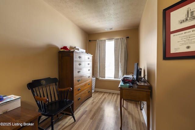 6716 Arbor Creek Dr, Louisville, KY 40228 - sitting room featuring a textured ceiling, light wood-type flooring, and an office area