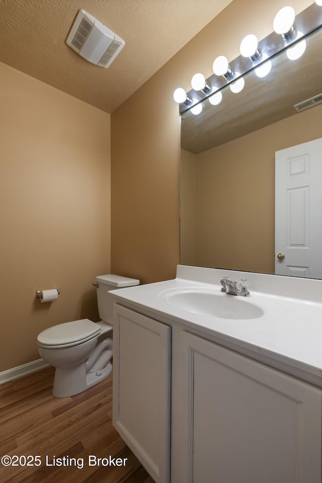 6716 Arbor Creek Dr, Louisville, KY 40228 - half bathroom with wood finished floors and vanity