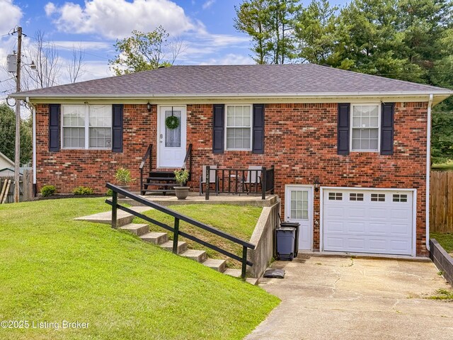1410 Sycamore Ln, Leitchfield, KY 42754 - view of front of home featuring an attached garage, concrete driveway, entry steps, brick siding, and a shingled roof