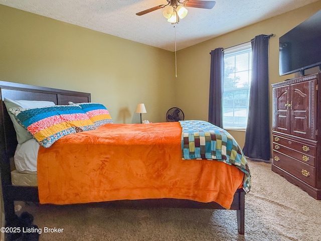 1410 Sycamore Ln, Leitchfield, KY 42754 - bedroom featuring carpet, a textured ceiling, and a ceiling fan