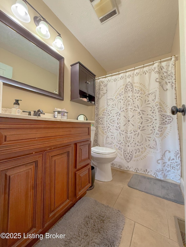 1410 Sycamore Ln, Leitchfield, KY 42754 - full bath featuring tile patterned flooring, vanity, curtained shower, and a textured ceiling