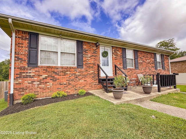 1410 Sycamore Ln, Leitchfield, KY 42754 - single story home with entry steps, a front yard, brick siding, and a patio