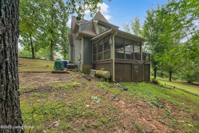 171 Cedar Point Rd, Bee Spring, KY 42207 - rear view of property with a sunroom