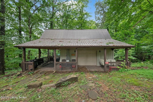 171 Cedar Point Rd, Bee Spring, KY 42207 - view of front of home featuring board and batten siding and a metal roof