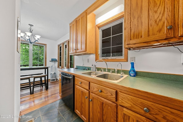 171 Cedar Point Rd, Bee Spring, KY 42207 - kitchen with dishwasher, a chandelier, and brown cabinetry