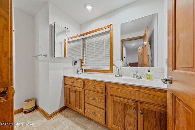 171 Cedar Point Rd, Bee Spring, KY 42207 - bathroom featuring vanity and backsplash