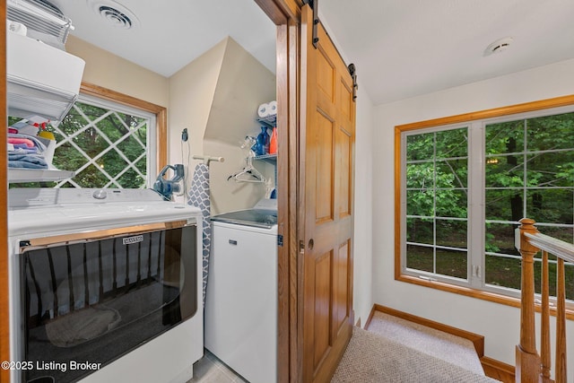 171 Cedar Point Rd, Bee Spring, KY 42207 - washroom with separate washer and dryer and a barn door