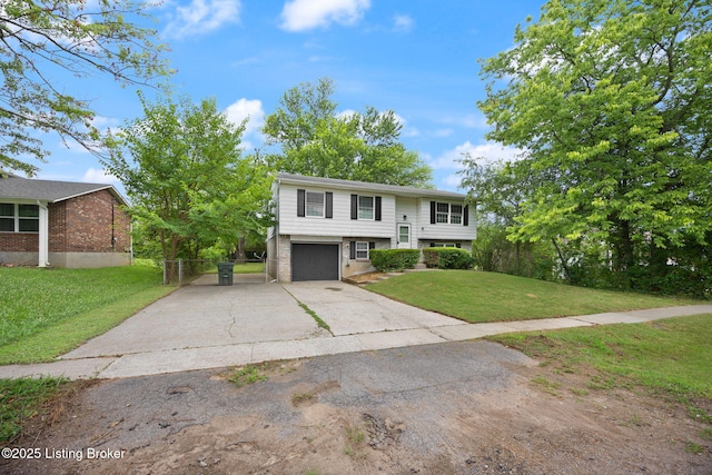 547 Wyandot Ct, Radcliff, KY 40160 - raised ranch with concrete driveway, an attached garage, and brick siding