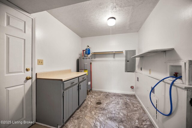547 Wyandot Ct, Radcliff, KY 40160 - laundry area with electric water heater, hookup for a washing machine, electric panel, and a textured ceiling