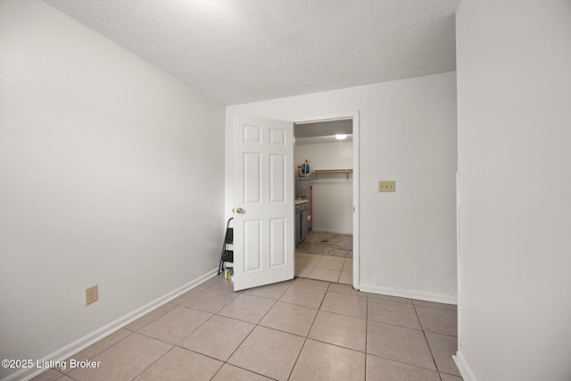 547 Wyandot Ct, Radcliff, KY 40160 - empty room with light tile patterned flooring and baseboards