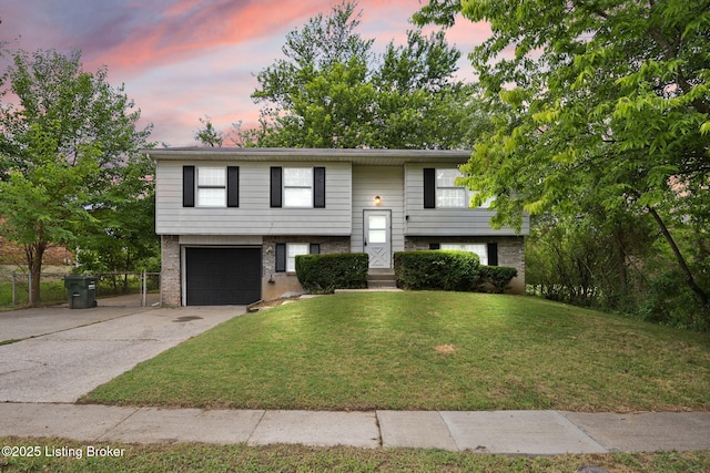 547 Wyandot Ct, Radcliff, KY 40160 - raised ranch with an attached garage, driveway, and brick siding