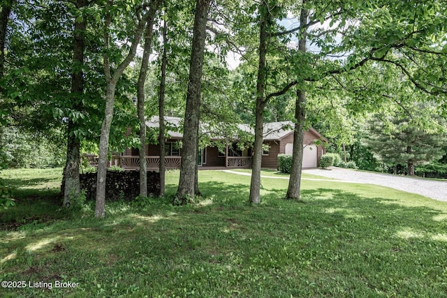 1974 N Grandview Church Rd, Cecilia, KY 42724 - view of front of property featuring driveway, an attached garage, and a front lawn