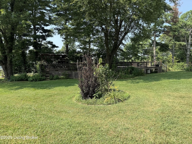 1001 Caney Fork Rd, Bardstown, KY 40004 - view of grassy yard with a wooden deck and view of wooded area