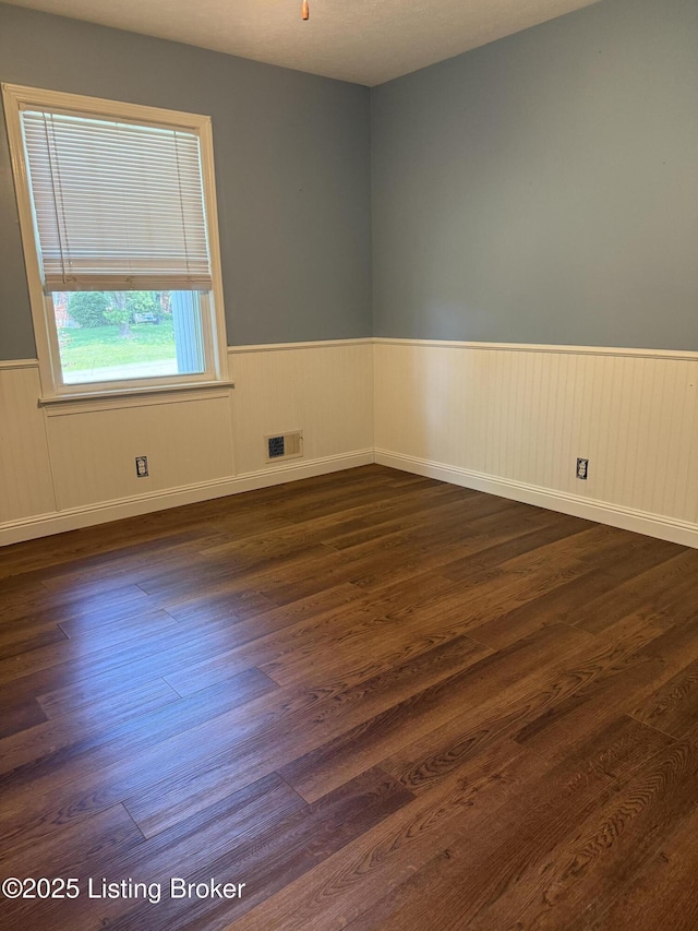 1001 Caney Fork Rd, Bardstown, KY 40004 - unfurnished room featuring a wainscoted wall and dark wood finished floors