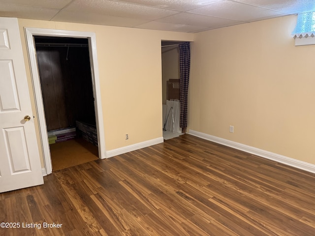 1001 Caney Fork Rd, Bardstown, KY 40004 - unfurnished bedroom featuring dark wood-style flooring and baseboards