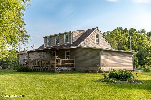 4883 S Reeves Rd, Scottsburg, IN 47170 - rear view of house featuring a yard