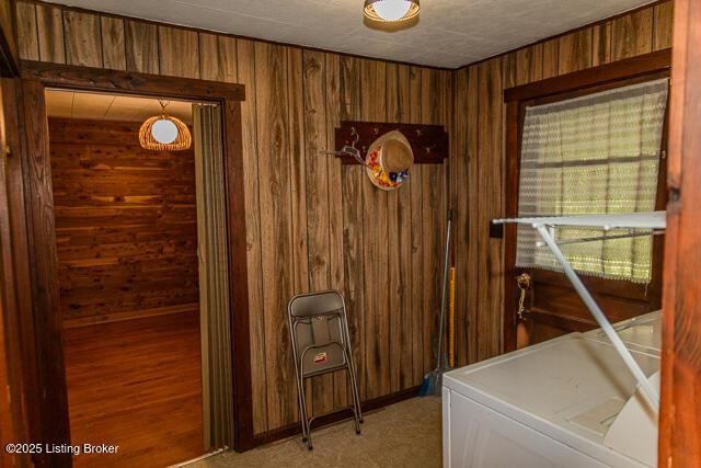 4883 S Reeves Rd, Scottsburg, IN 47170 - hall featuring wood walls and washer / dryer