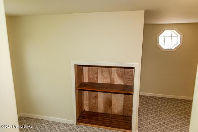 4883 S Reeves Rd, Scottsburg, IN 47170 - detailed view of carpet and baseboards
