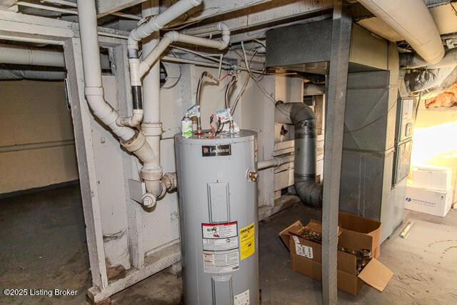 4883 S Reeves Rd, Scottsburg, IN 47170 - utility room with electric water heater
