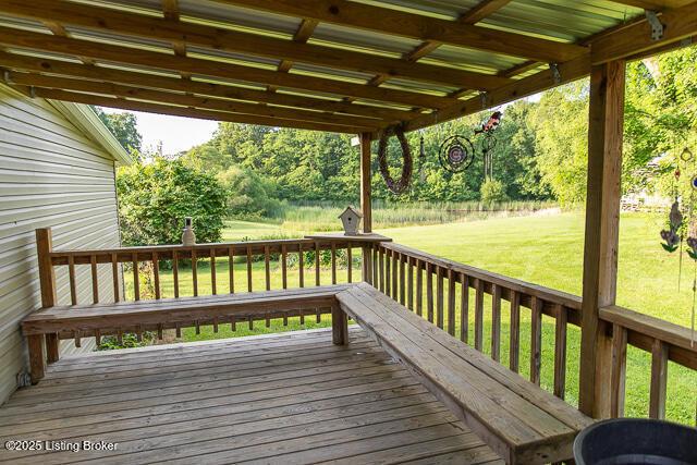 4883 S Reeves Rd, Scottsburg, IN 47170 - wooden terrace with a yard