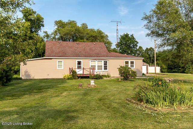 4883 S Reeves Rd, Scottsburg, IN 47170 - rear view of property featuring a yard and a deck