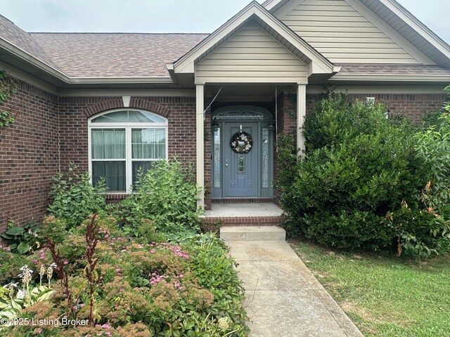 8 San Juan Ct, Elizabethtown, KY 42701 - entrance to property featuring brick siding and a shingled roof