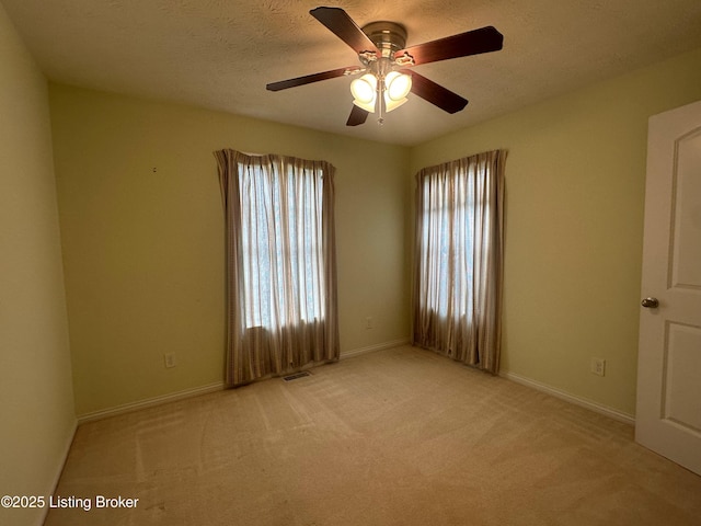 8 San Juan Ct, Elizabethtown, KY 42701 - spare room featuring carpet floors, ceiling fan, and a textured ceiling