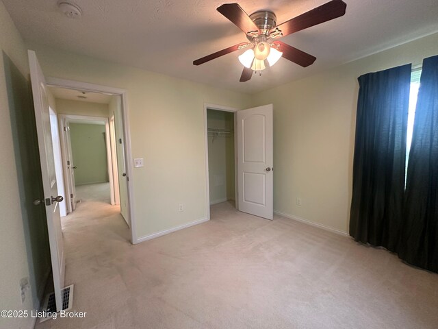 8 San Juan Ct, Elizabethtown, KY 42701 - unfurnished bedroom with light colored carpet, a ceiling fan, and a closet