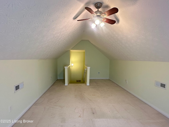 8 San Juan Ct, Elizabethtown, KY 42701 - bonus room featuring a textured ceiling, vaulted ceiling, a ceiling fan, and carpet floors